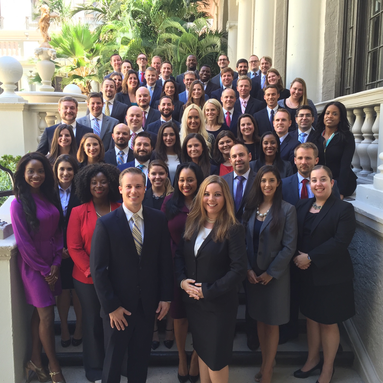 FLAYLD board members pictured in a group on the front steps of a historic building