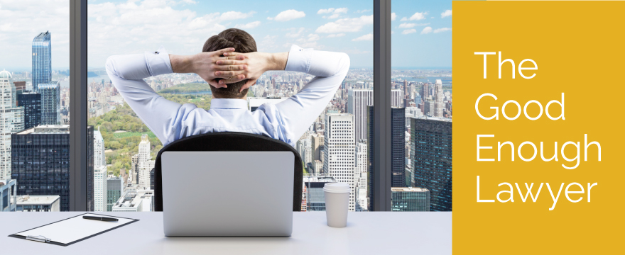 Relaxed businessman has his hands folded on the back of his head while he leans back in his office chair and looks out of the window to an expansive downtown skyline below