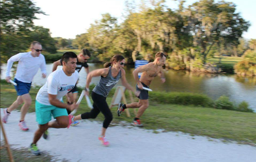 A group of runners starts a race outdoors