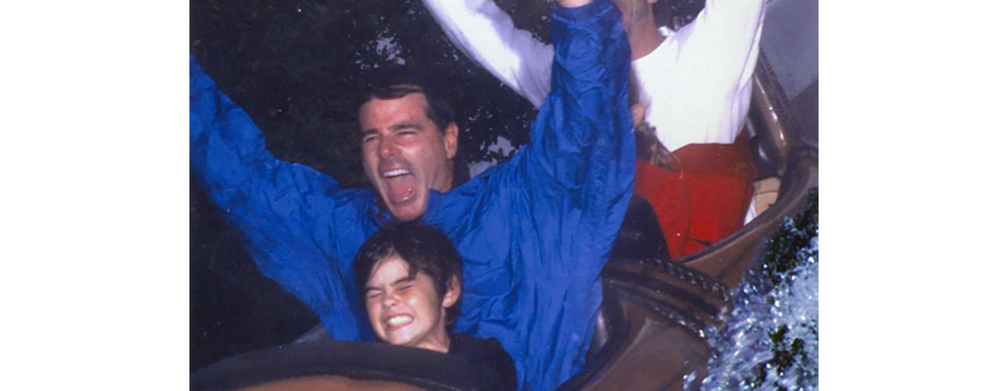 FLAYLD_HealthWellness_BillSchifino_2016_White Bill Schifino is pictured with a young boy on a roller coaster ride