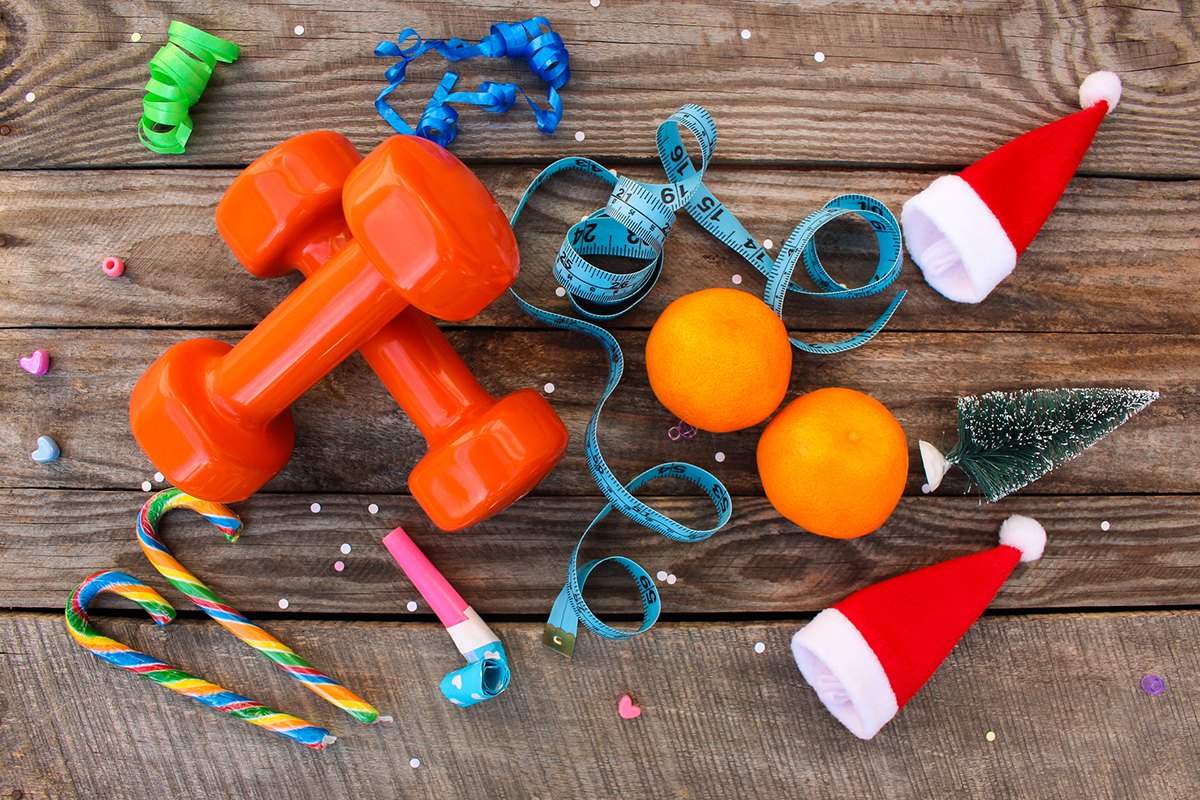 Health Wellness Christmas Image, Santa hats, Hand Weights, candy canes, health ruler, confetti, small Christmas tree, party noisemaker