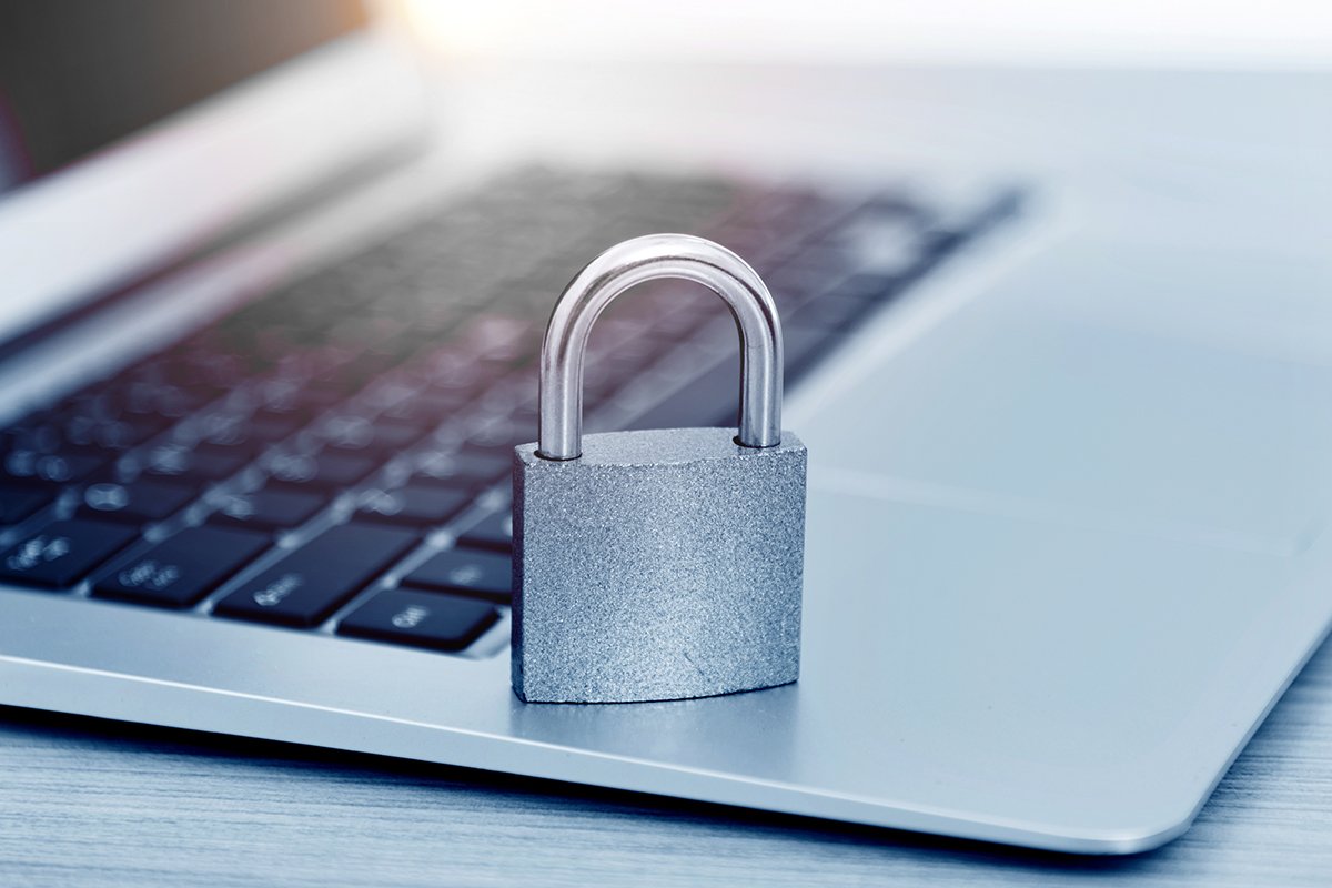 Padlock on laptop keyboard